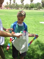 kid-with-kite-e1466513029397-150x200